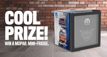 A mopar themed mini-fridge against a brick background with a caption reading 'Cool Prize! Win a Mopar Mini-Fridge.'